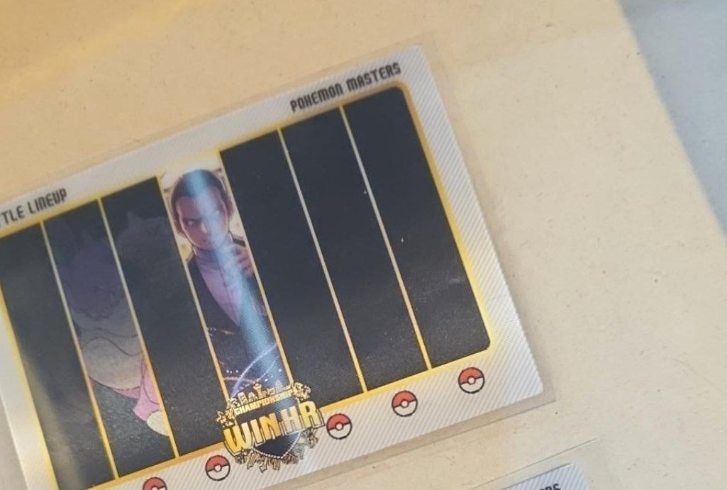 Pokémon Masters Lenticular — Card A photographed in the Laurarium Card Garden collection