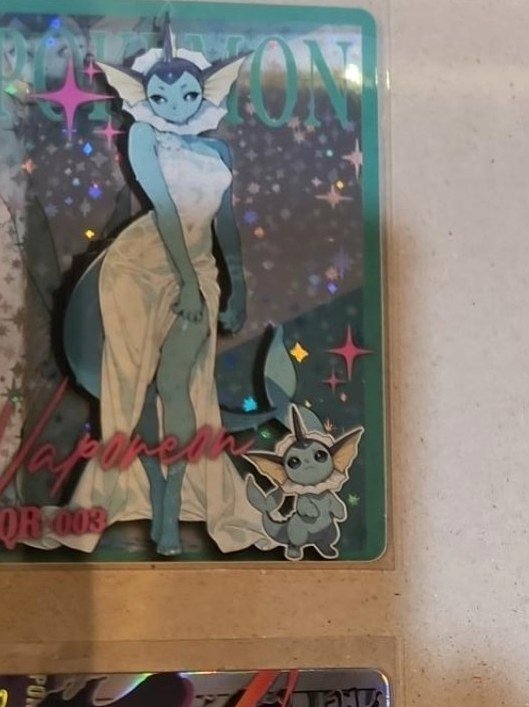 Vaporeon Art Card photographed in the Laurarium Card Garden collection